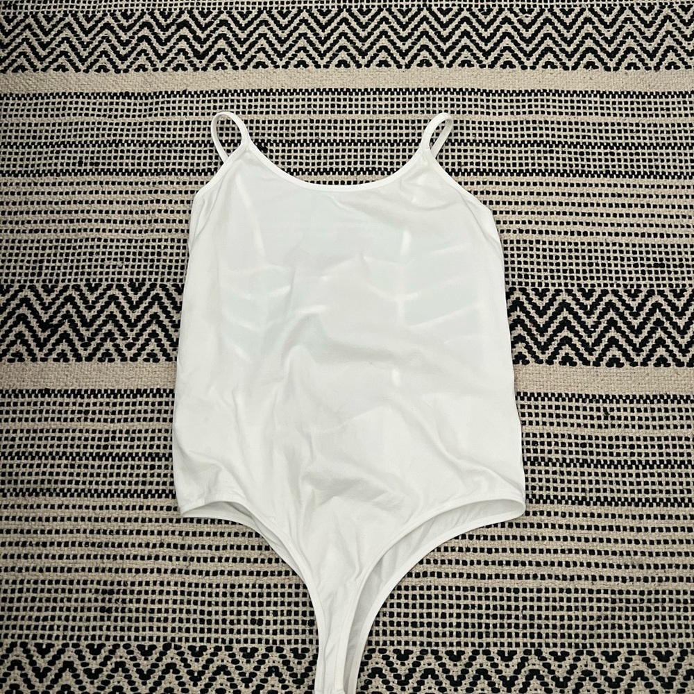 White body suit with open back